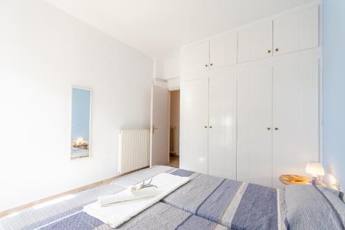Postel nebo postele na pokoji v ubytování Gaia Residence