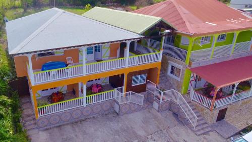 an overhead view of a house with a play structure at LE VILLAGE DE CANADA in Faup