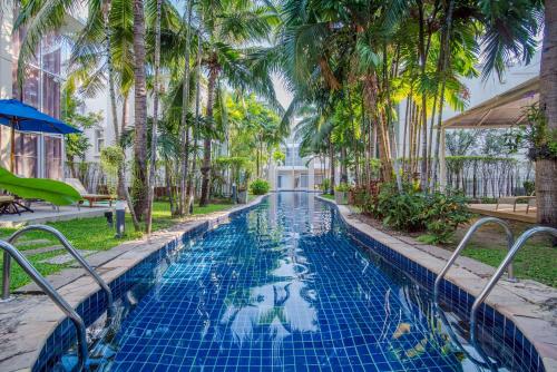 Πισίνα στο ή κοντά στο The Palayana Hua Hin