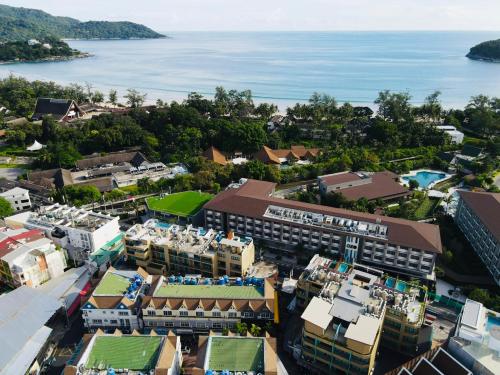 an aerial view of a city with the ocean at Must Sea Hotel - SHA Hotel in Kata Beach
