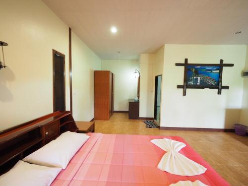 Postel nebo postele na pokoji v ubytování Baan Pak Rim Kuaen Resort