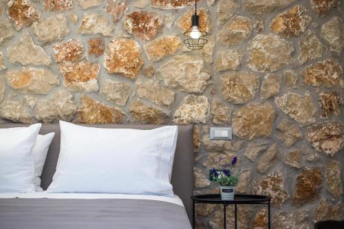 A bed or beds in a room at Kastalys Villa