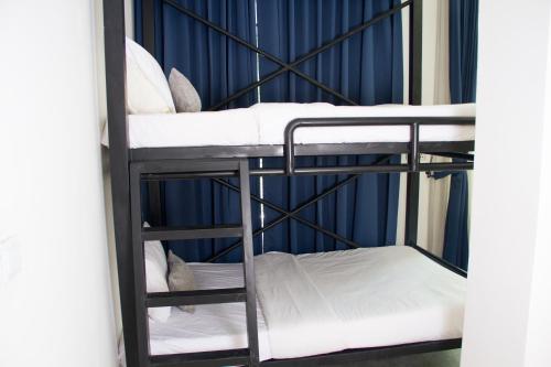 Кровать или кровати в номере Bopha Bassac Boutique Hotel