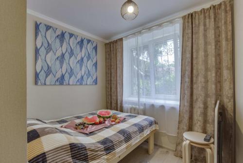 Krevet ili kreveti u jedinici u objektu YourHouse на Гагарина Утепова - экономичнее квартиры, уютнее гостиницы