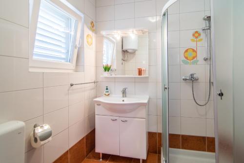 Kylpyhuone majoituspaikassa Apartment Vesna