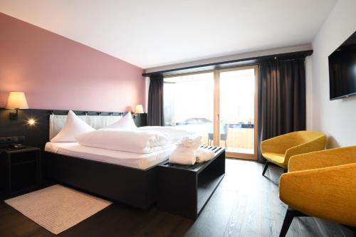 Hotel Brunnerhofにあるベッド