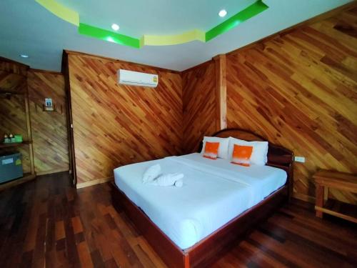 Postel nebo postele na pokoji v ubytování Palmsuay Resort