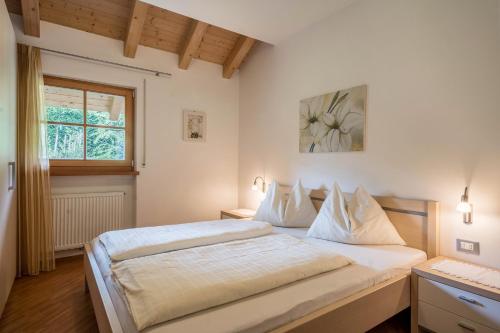 Posteľ alebo postele v izbe v ubytovaní Tischlerhof - Typ A mit Balkon