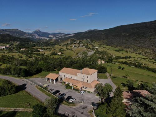 an aerial view of a house in a field at Hôtel le Panoramic - Votre Hôtel au cœur des Gorges du Verdon in La Palud sur Verdon