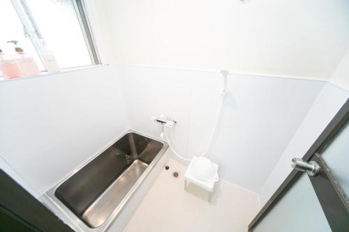 Koupelna v ubytování Yokkaichi Nishishinchi Hotel
