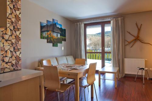 Posedenie v ubytovaní Aba Apartamenty