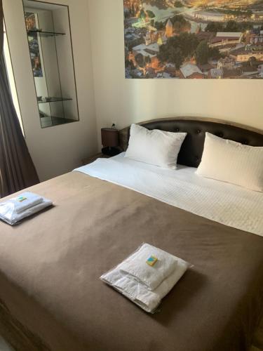 Кровать или кровати в номере Sweet Rooms Inn
