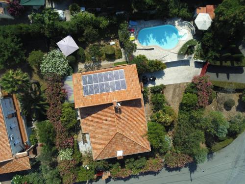 an overhead view of a house with a solar panel on its roof at VILLA ESTEREL in Saint-Raphaël