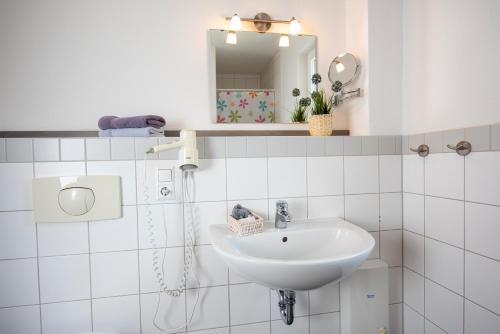 Et badeværelse på De Kanalkieker Apartmenthaus Meier