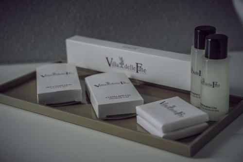 a shelf with three products on top of it at Hotel Villa delle Fate, BW Signature Collection in Sestola