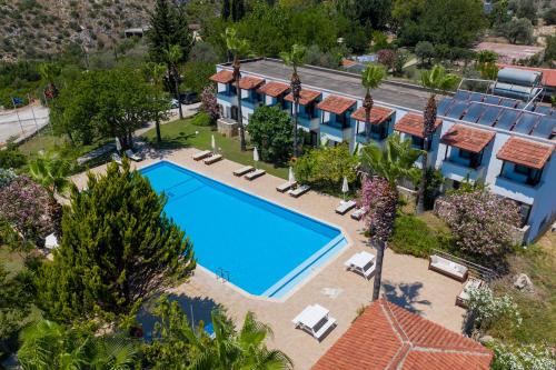 an aerial view of a hotel with a swimming pool at Xanthos Boutique Hotel Patara in Patara