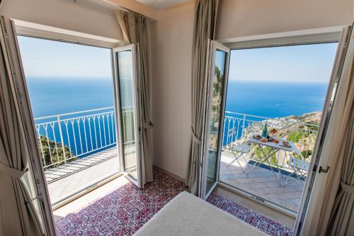 a room with a view of the ocean at Hotel le Rocce - Agerola, Amalfi Coast in Agerola
