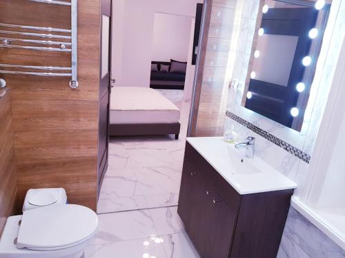 Ett badrum på Hotel Magnat
