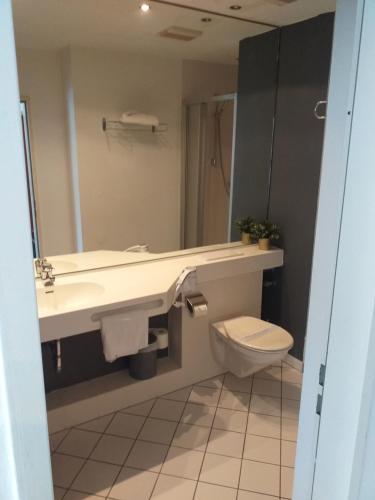 Koupelna v ubytování Hotel Milin