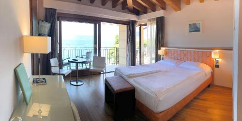 Ένα ή περισσότερα κρεβάτια σε δωμάτιο στο Hotel Lido