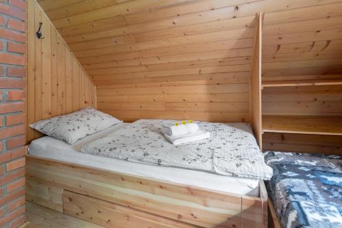 Postel nebo postele na pokoji v ubytování Zalin planinski raj