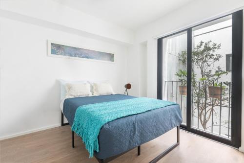 Voodi või voodid majutusasutuse Loft cómodo, seguro y con estilo, en el corazon del Centro Histórico toas