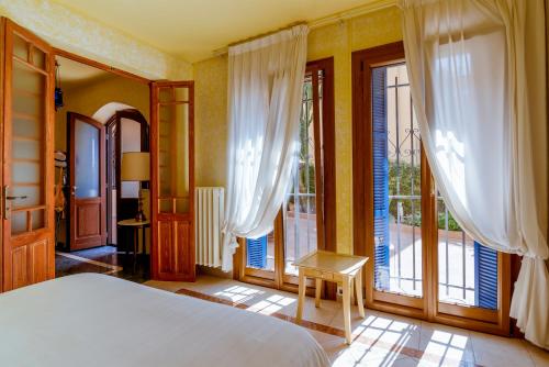 Ліжко або ліжка в номері Villa Vallone Apartment