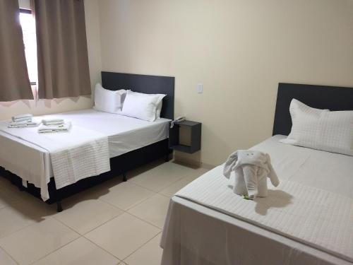 Katil atau katil-katil dalam bilik di Hotel Vale Do Ivinhema