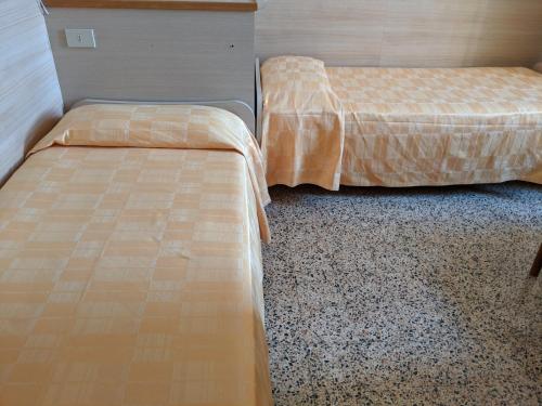
Cama o camas de una habitación en Hotel Dorico
