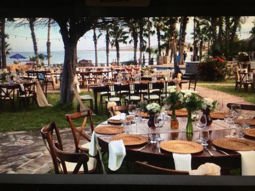 a table set up for a party at the beach at Hotel Rancho Buenavista in Los Barriles
