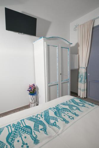 Postel nebo postele na pokoji v ubytování Hotel Made