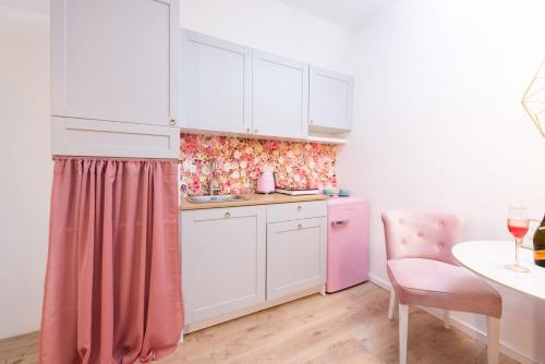 Kuchyň nebo kuchyňský kout v ubytování La Rossa Sopot Apartaments