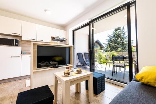 Η κουζίνα ή μικρή κουζίνα στο Apartmaji BANONIA