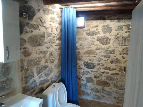 Ванная комната в panos stone tower