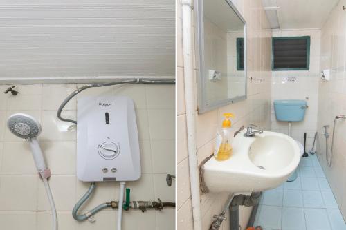 a bathroom with a sink and a shower at SPOT ON 89789 Hotel Check In 2 in Brinchang