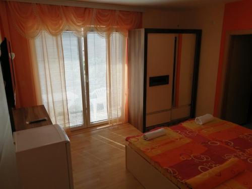 Postel nebo postele na pokoji v ubytování Villa Mimi