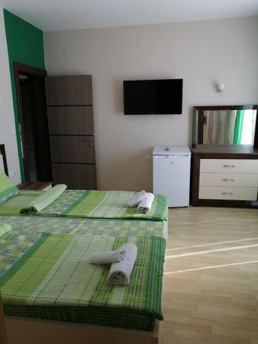 Postel nebo postele na pokoji v ubytování Villa Mimi
