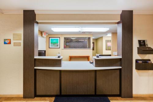 a waiting room at a hospital with two sinks at Candlewood Suites Medford by IHG in Medford