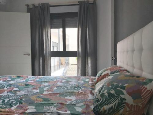 Katil atau katil-katil dalam bilik di Bnbook Medea Apartments