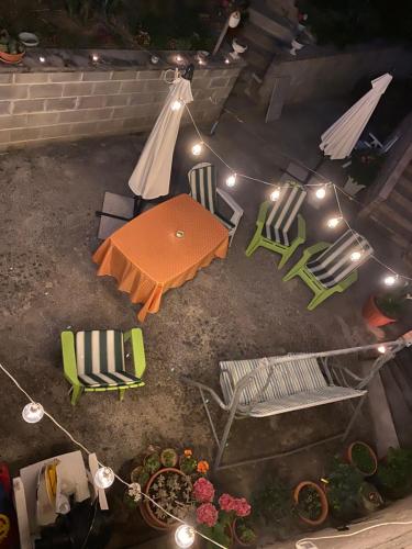 an overhead view of a patio with a table and chairs at Casa Vacanze Gli Allori in Venarotta