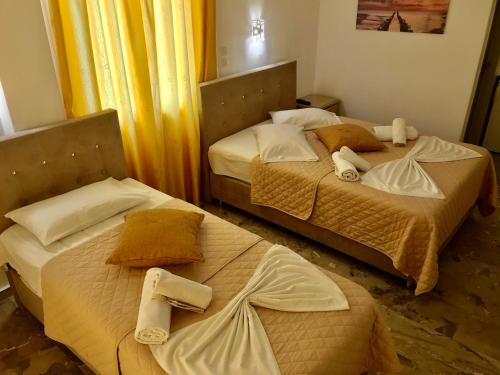 Vassiliki Roomsにあるベッド