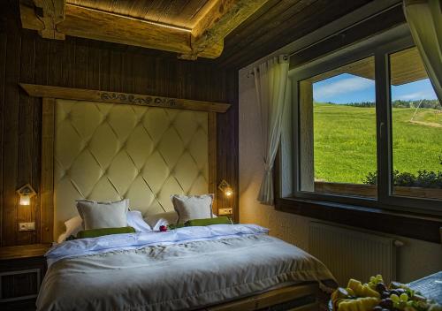 Grand Hotel**** Bachledka Strachanにあるベッド