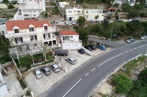 an overhead view of a street with cars parked next to a road at Rooms Monika in Dubrovnik