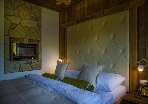 Grand Hotel**** Bachledka Strachanにあるベッド