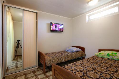 Postel nebo postele na pokoji v ubytování Одесская,8