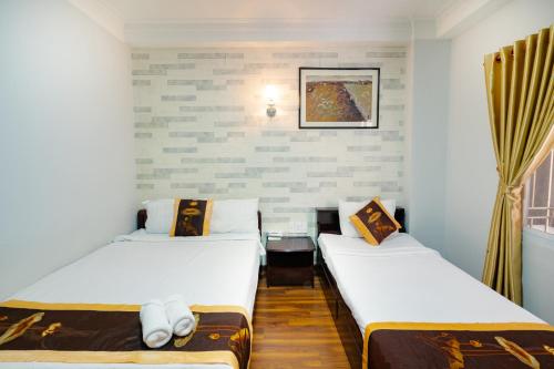 Katil atau katil-katil dalam bilik di Saigon Amigo Hotel