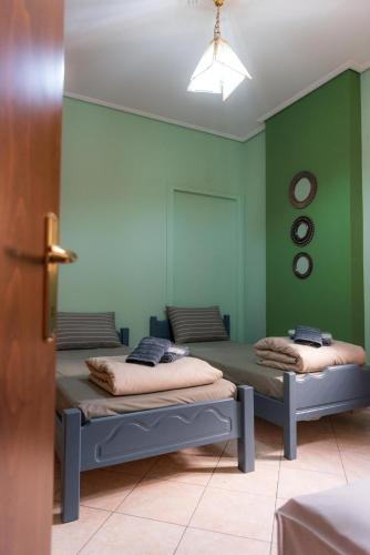 Ένα ή περισσότερα κρεβάτια σε δωμάτιο στο Athena's Luxury Place