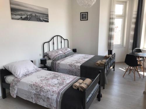 Ένα ή περισσότερα κρεβάτια σε δωμάτιο στο STUDIO APARTMANI PAOLA