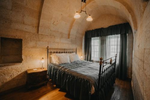 Katil atau katil-katil dalam bilik di Dere Suites Cappadocia