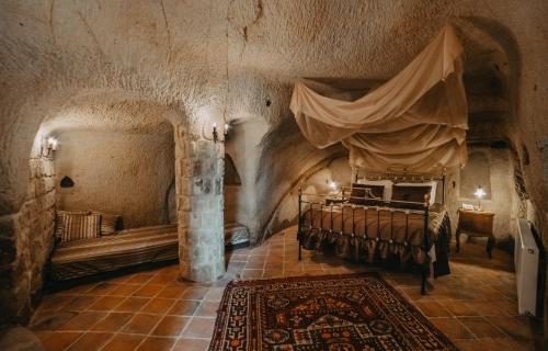 Katil atau katil-katil dalam bilik di Dere Suites Cappadocia